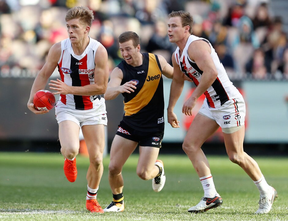 AFL 2016 Rd 22 - Richmond v St Kilda MELBOURNE, AUSTRALIA - AUGUST 20: Sebastian Ross of the Saints in action ahead of Kane Lambert of the Tigers and David Armitage of the Saints during the 2016 AFL Round 22 match between the Richmond Tigers and the St Kilda Saints at the Melbourne Cricket Ground on August 20, 2016 in Melbourne, Australia. (Photo by Adam Trafford/AFL Media)
